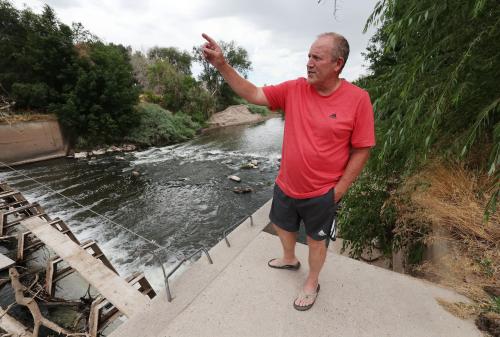 Brad Blanch looks over a dam on the Weber River in Weber County on Wednesday, July 26, 2023. Blanch is a West Weber resident who wants to lease several hundred acre-feet of water to benefit the Great Salt Lake. Jeffrey D. Allred, Deseret News